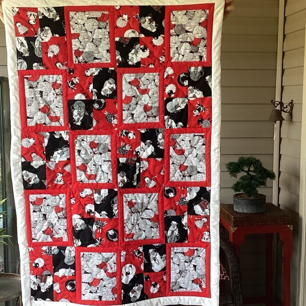 NWT. Black White and Red Sheep Lap Quilt Hand Crafted